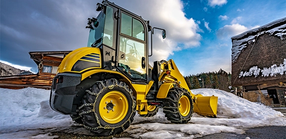 snow removal image two snow removal tractor close up view