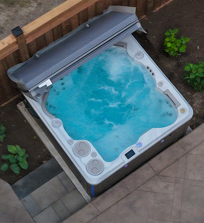 top view of hot tub in home backyard