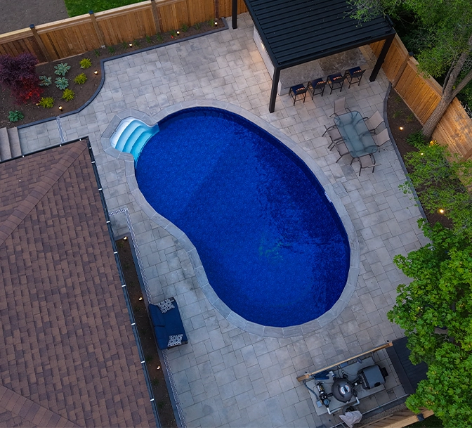 interlocking surface around pool. full backyard top view