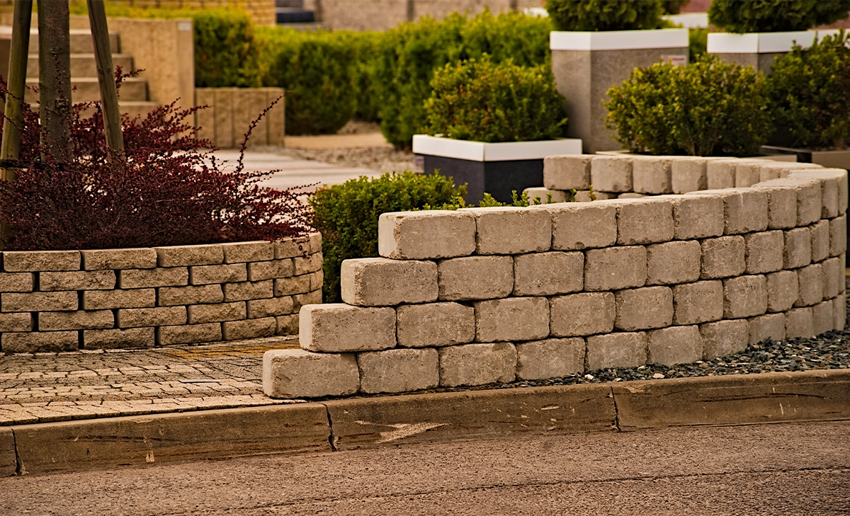 traditional concrete block retaining walls around road