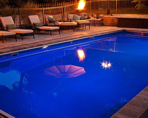 vinyl pool and gathering setup in backyard