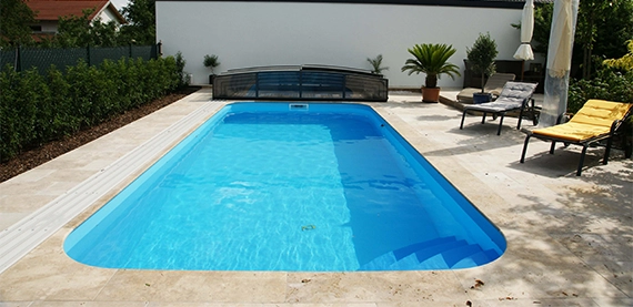 vinyl pool with pool cover, titles floor in backspace