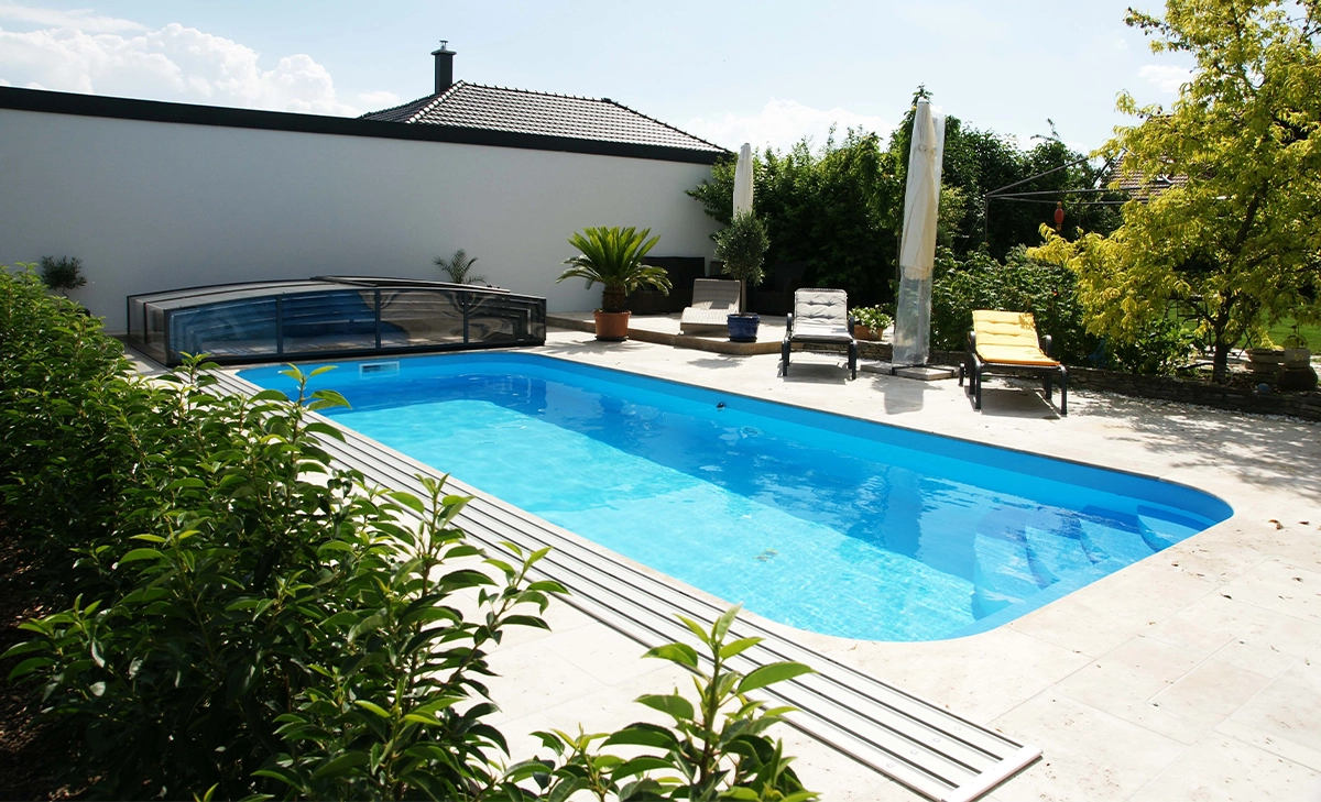 vinyl pool with pool cover, titles floor in backspace