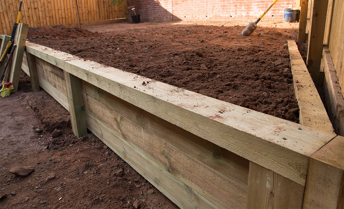 wooden retaining wall installation wooden retaining wall installation