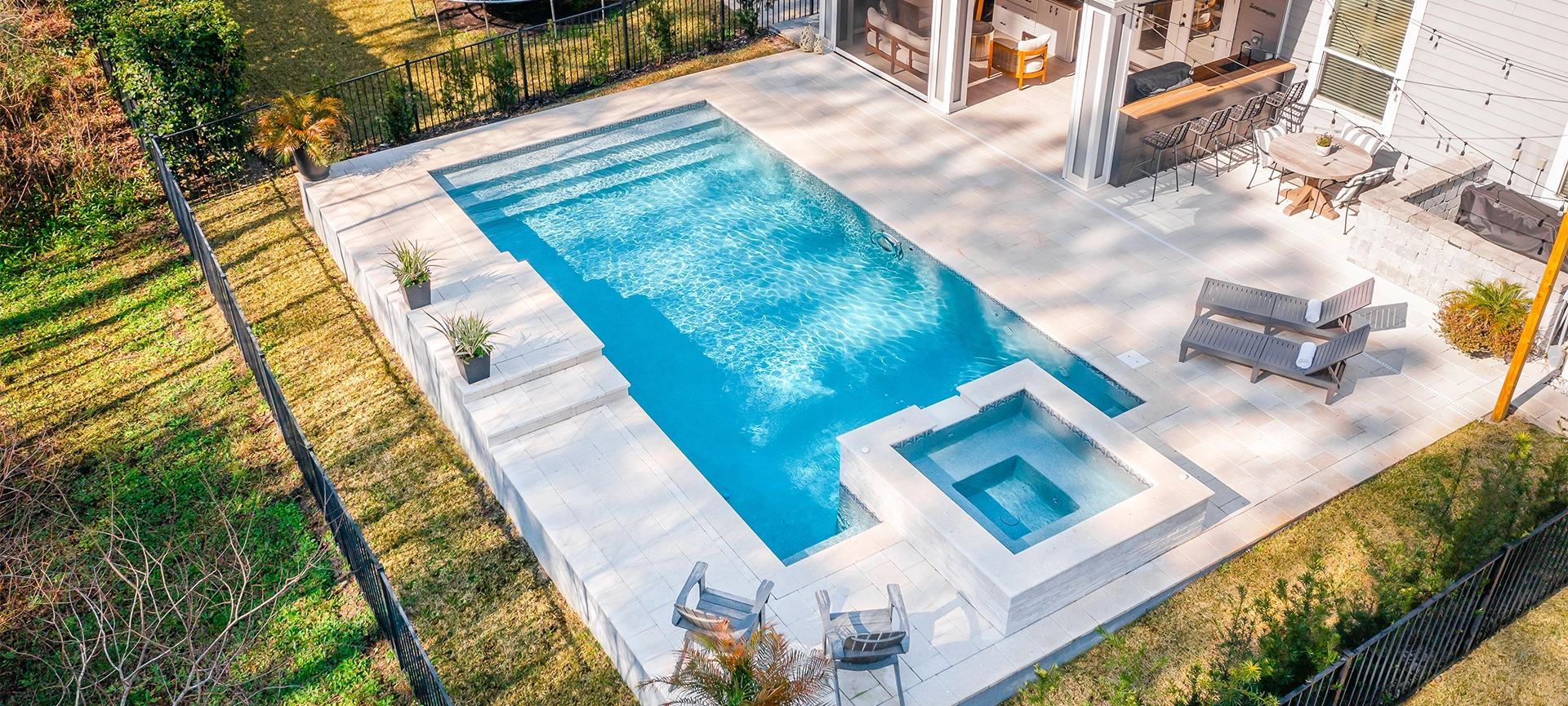 Beautiful Backyard With A New Pool On A Hot Summer Day