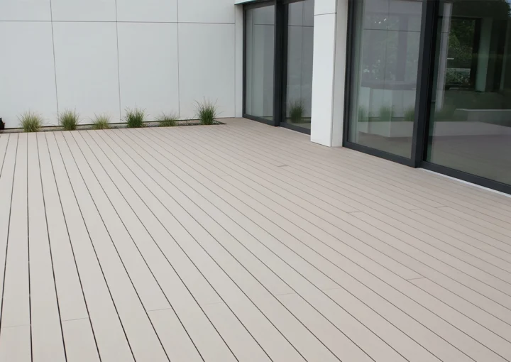 This image showcases a modern deck made of composite materials, perfect for outdoor living and entertaining