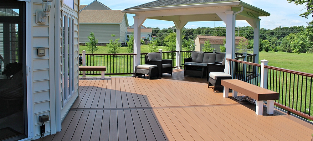 composite decking and gazebo toward home backyard