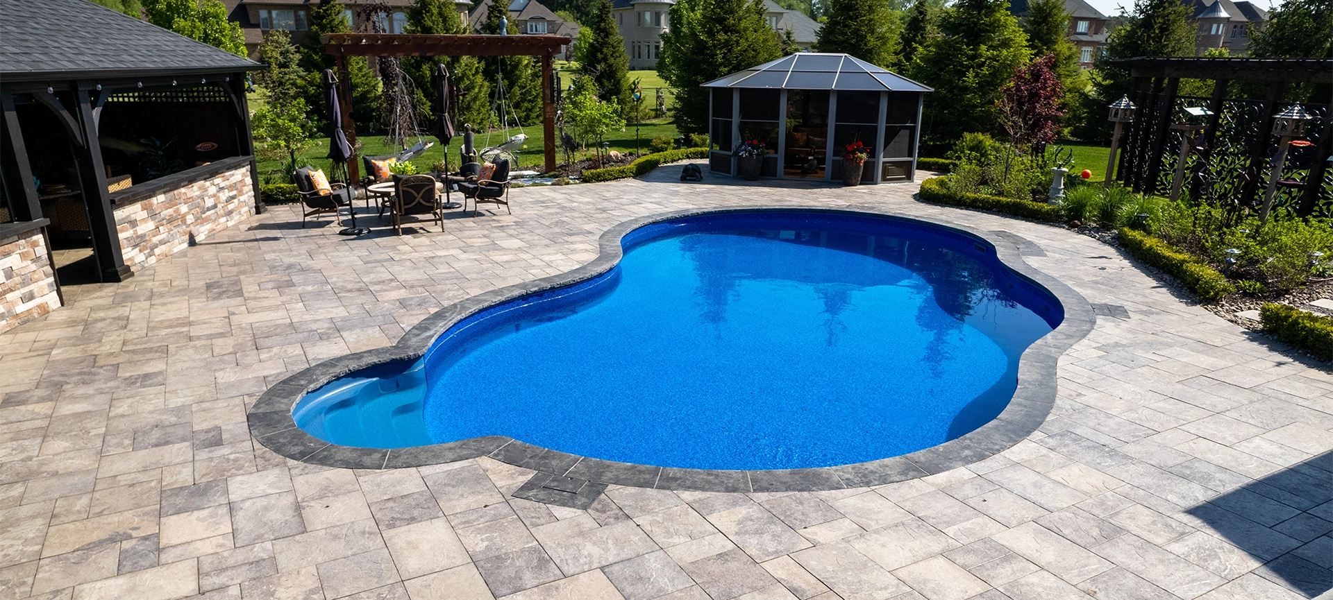 Indulge in the ultimate luxury with poolside relaxation, stunning drone views of upscale houses, and the charm of a desirable neighborhood