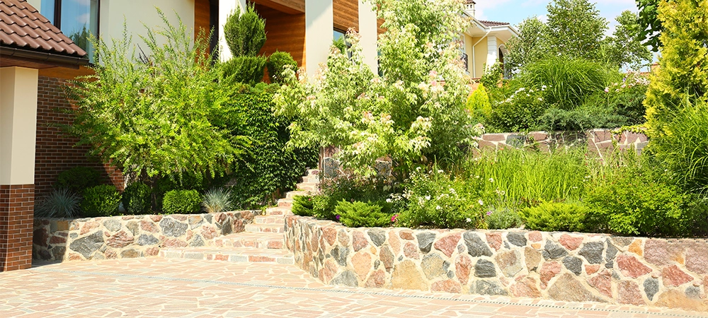 stone retaining wall for sloping backyard