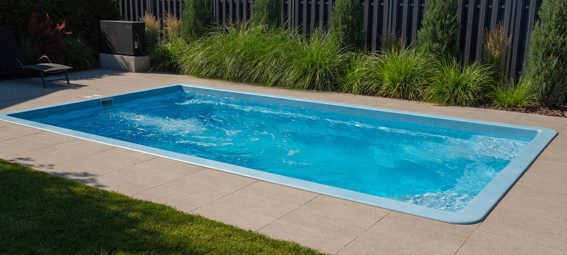 In the home pool, the counter-current system is turned on, making it an excellent place to swim in the backyard