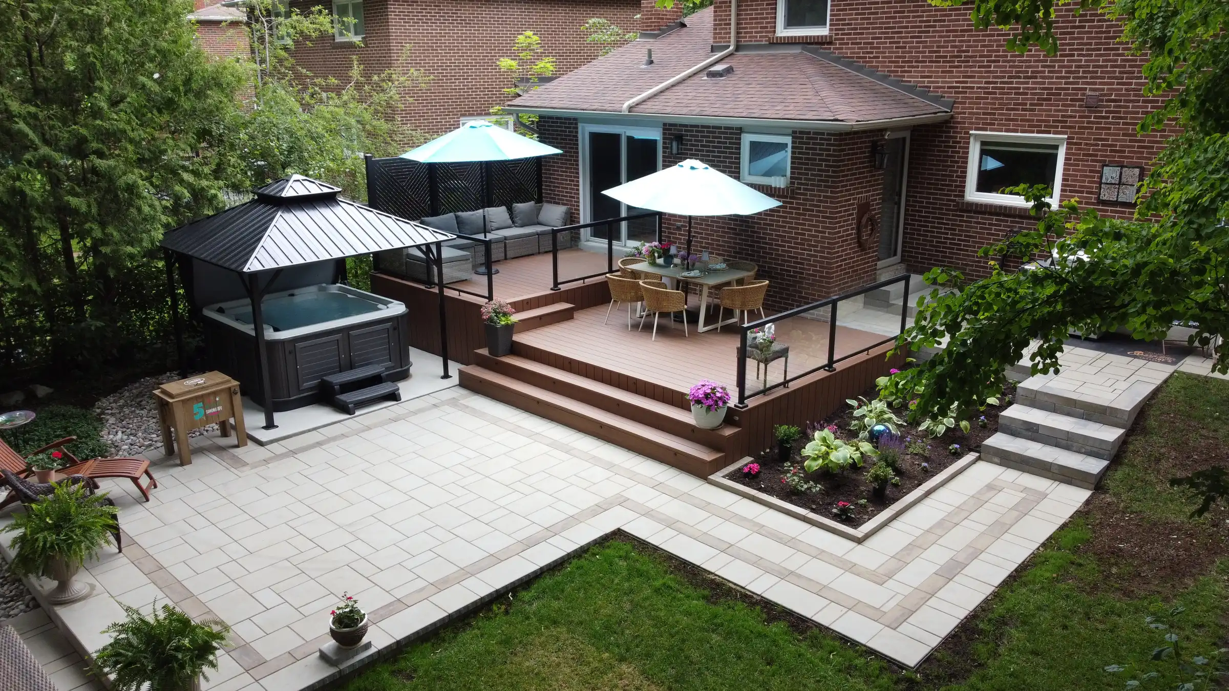 aerial backyard with deck and hot tub