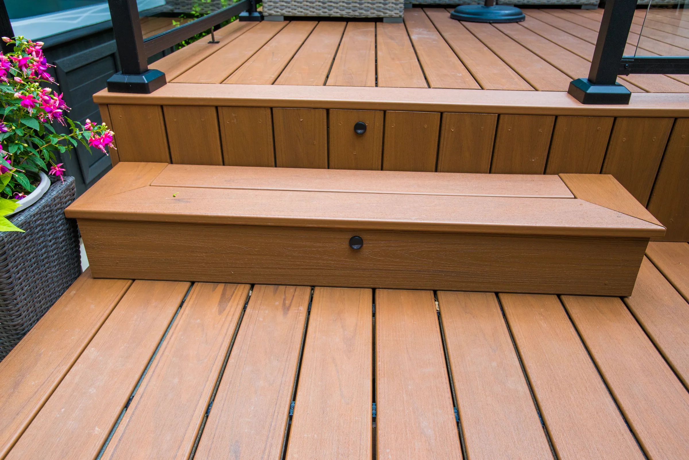 backyard composite deck stairs with lighting