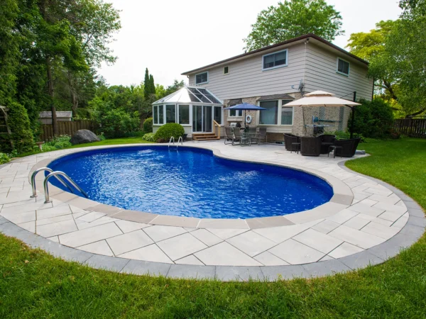 scarborough-pool-restoration-photo-03 Restored backyard pool with new interlock coping
