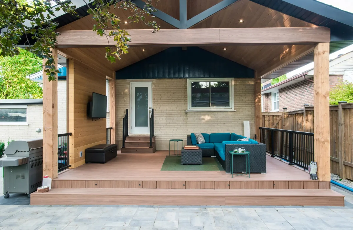 Front view of a custom wooden pergola over a deck
