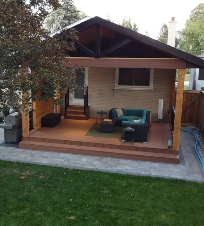 Custom pergola with outdoor seating and lawn