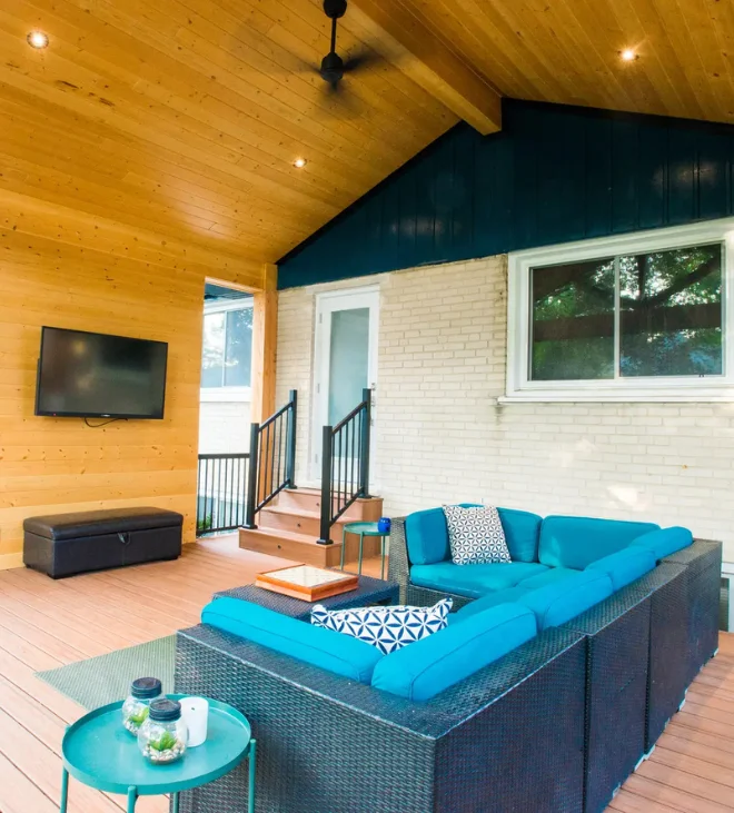 Lounge seating on a deck under a custom pergola