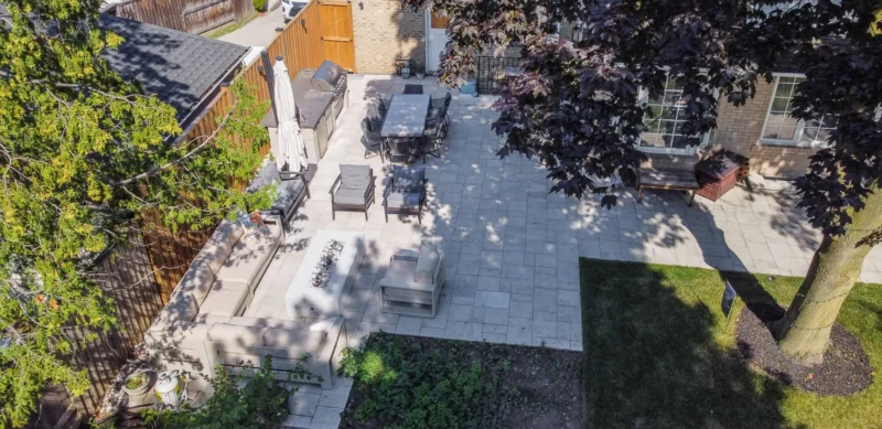 Aerial view of North York interlocking patio with outdoor kitchen and dining area