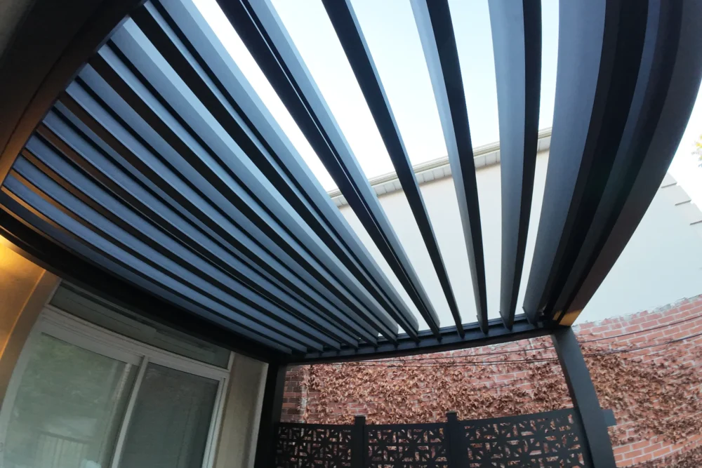 Electric louvered pergola roof seen from below