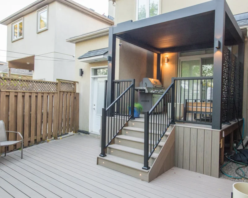 Angled view of the electric pergola and Trex deck