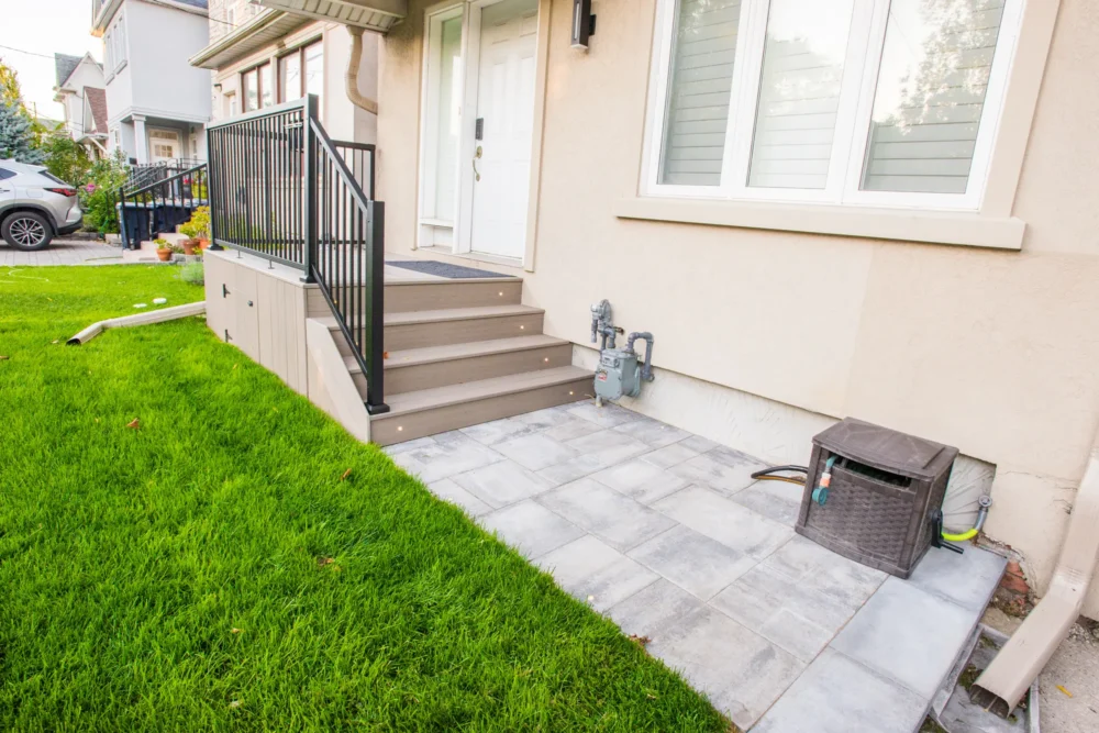 Front porch interlock landing with composite steps