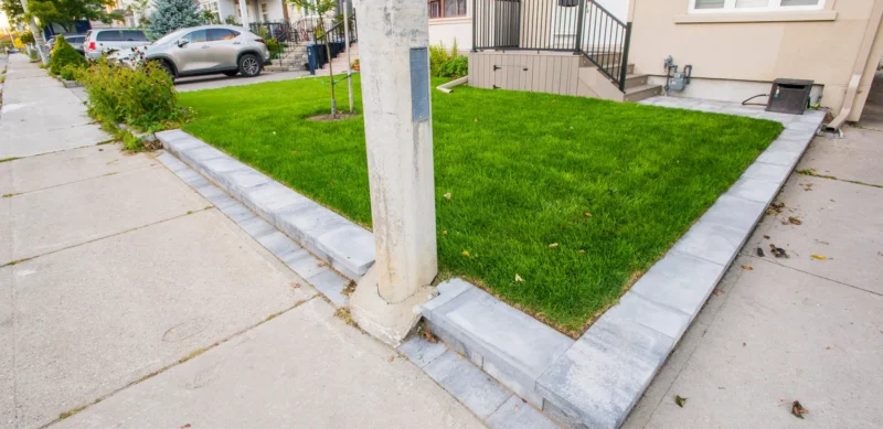 Front yard interlock border along the lawn