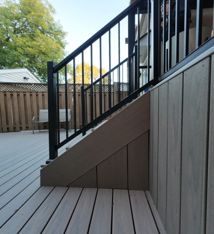 Trex stair skirting with black aluminum railing